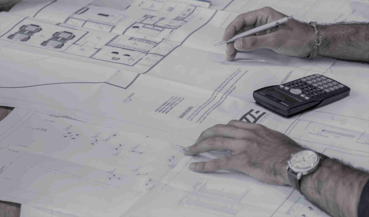 Legend-Consultants-project-management-resized man looking at blueprint